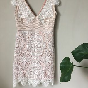 Worn once. Lace dress with pink underlay
